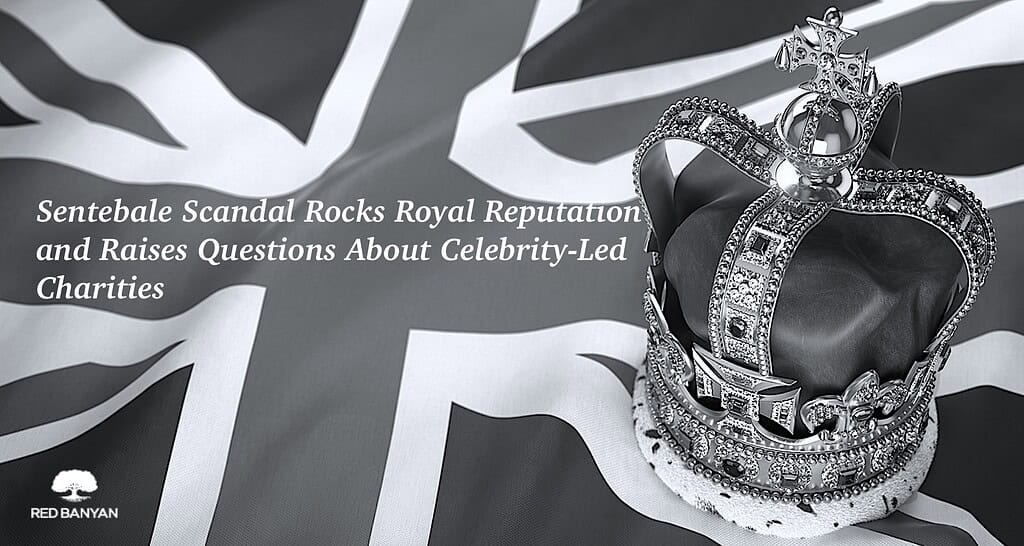 black and white photo of british royal crown on sitting on top of a union jack flag